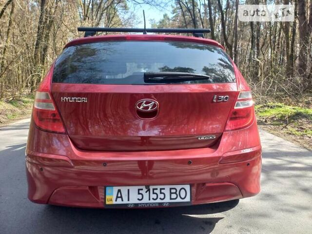 Червоний Хендай i30, об'ємом двигуна 1.6 л та пробігом 160 тис. км за 7600 $, фото 6 на Automoto.ua