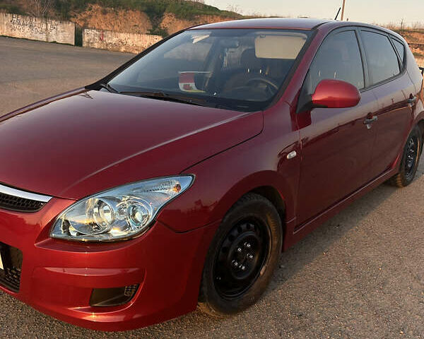 Красный Хендай i30, объемом двигателя 1.59 л и пробегом 227 тыс. км за 6200 $, фото 4 на Automoto.ua