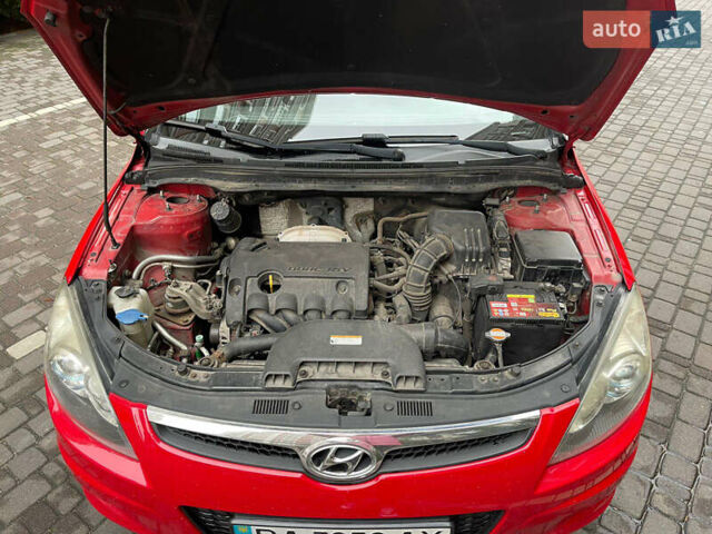 Красный Хендай i30, объемом двигателя 1.59 л и пробегом 195 тыс. км за 7200 $, фото 13 на Automoto.ua