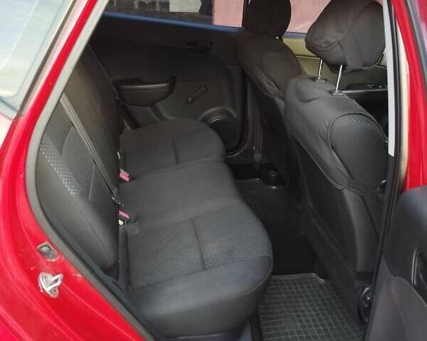 Красный Хендай i30, объемом двигателя 1.6 л и пробегом 190 тыс. км за 6200 $, фото 7 на Automoto.ua