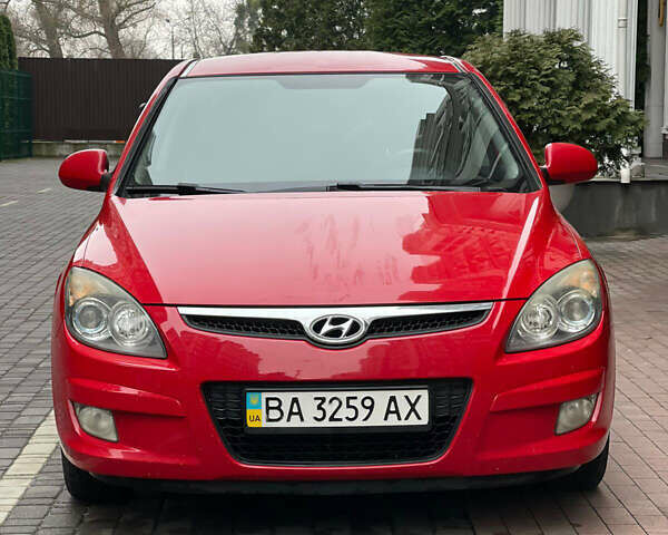Красный Хендай i30, объемом двигателя 1.59 л и пробегом 195 тыс. км за 7200 $, фото 7 на Automoto.ua