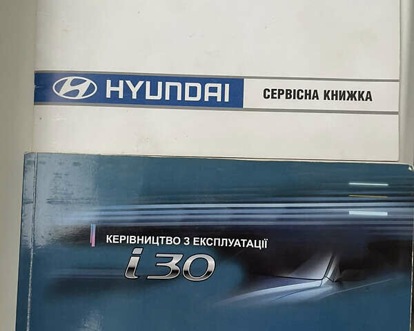 Красный Хендай i30, объемом двигателя 1.59 л и пробегом 195 тыс. км за 7200 $, фото 65 на Automoto.ua