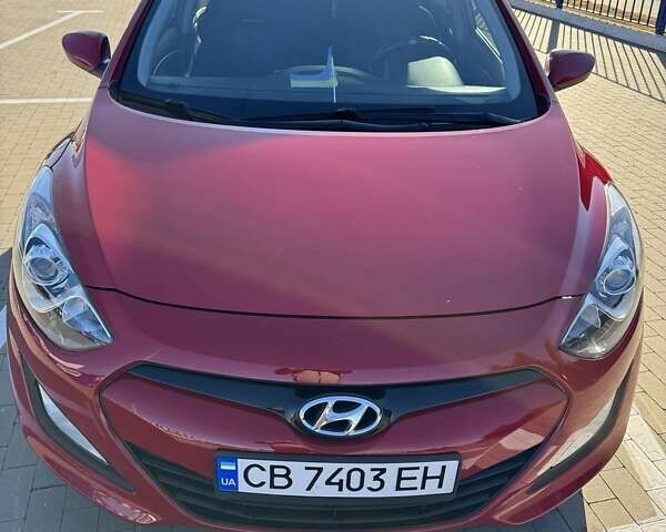 Красный Хендай i30, объемом двигателя 1.59 л и пробегом 131 тыс. км за 9000 $, фото 10 на Automoto.ua