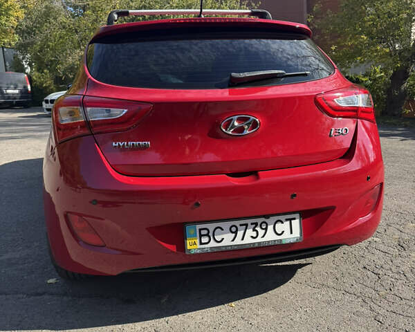 Червоний Хендай i30, об'ємом двигуна 1.59 л та пробігом 61 тис. км за 13000 $, фото 3 на Automoto.ua