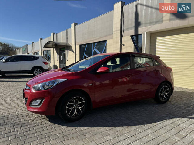 Червоний Хендай i30, об'ємом двигуна 1.4 л та пробігом 70 тис. км за 12500 $, фото 17 на Automoto.ua