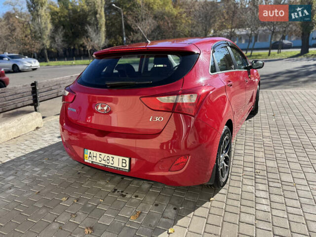 Червоний Хендай i30, об'ємом двигуна 1.4 л та пробігом 70 тис. км за 12500 $, фото 14 на Automoto.ua