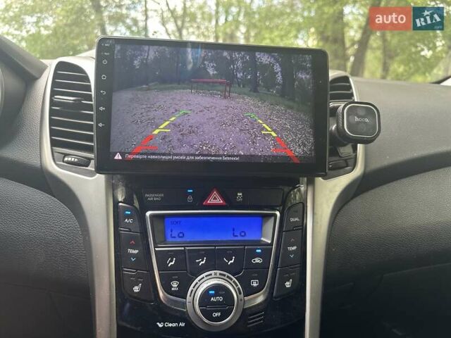 Красный Хендай i30, объемом двигателя 1.59 л и пробегом 100 тыс. км за 8500 $, фото 8 на Automoto.ua