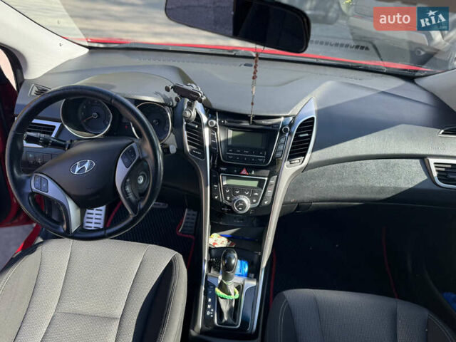 Червоний Хендай i30, об'ємом двигуна 1.59 л та пробігом 61 тис. км за 13000 $, фото 5 на Automoto.ua