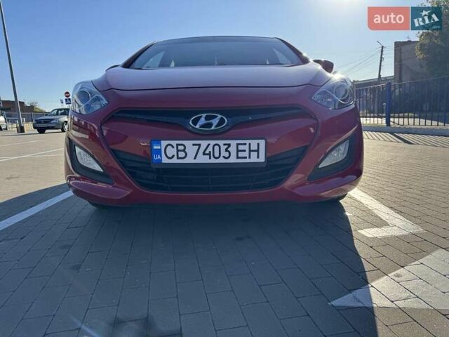 Красный Хендай i30, объемом двигателя 1.59 л и пробегом 131 тыс. км за 9000 $, фото 6 на Automoto.ua