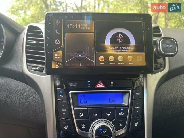 Красный Хендай i30, объемом двигателя 1.59 л и пробегом 100 тыс. км за 8500 $, фото 9 на Automoto.ua