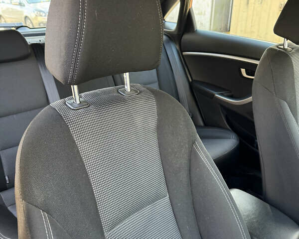 Червоний Хендай i30, об'ємом двигуна 1.4 л та пробігом 70 тис. км за 12500 $, фото 19 на Automoto.ua