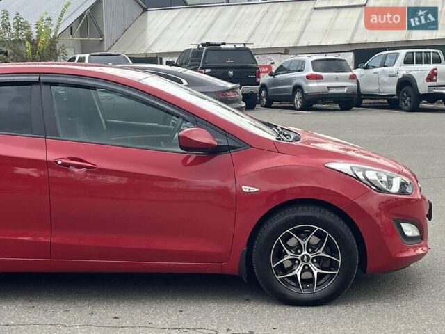 Хендай i30 2013 в Киеве на Automoto.ua Красный Хендай i30, объемом двигателя 1.4 л и пробегом 122 тыс. км за 9790 $, фото 4 на Automoto.ua