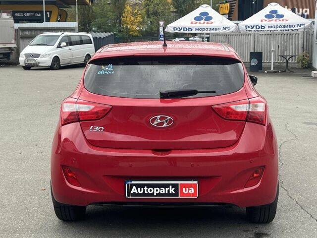 Хендай i30 2013 в Киеве на Automoto.ua Красный Хендай i30, объемом двигателя 1.4 л и пробегом 122 тыс. км за 9790 $, фото 6 на Automoto.ua