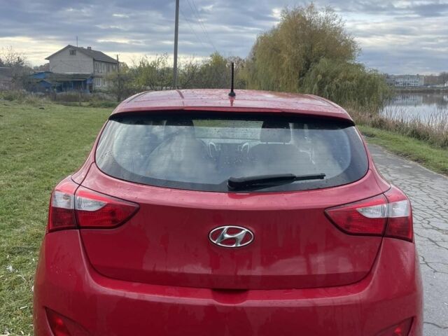 Хендай i30 2013 в Емильчином на Automoto.ua Красный Хендай i30, объемом двигателя 1.4 л и пробегом 85 тыс. км за 8200 $, фото 5 на Automoto.ua