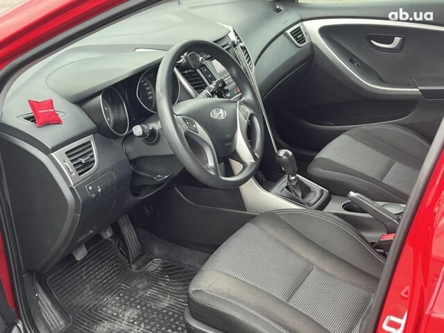 Хендай i30 2013 в Киеве на Automoto.ua Красный Хендай i30, объемом двигателя 1.4 л и пробегом 122 тыс. км за 9790 $, фото 10 на Automoto.ua