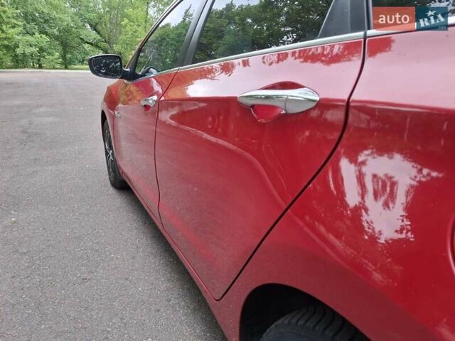 Красный Хендай i30, объемом двигателя 1.58 л и пробегом 208 тыс. км за 7700 $, фото 18 на Automoto.ua