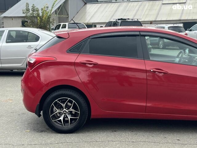 Хендай i30 2013 в Киеве на Automoto.ua Красный Хендай i30, объемом двигателя 1.4 л и пробегом 122 тыс. км за 9790 $, фото 4 на Automoto.ua
