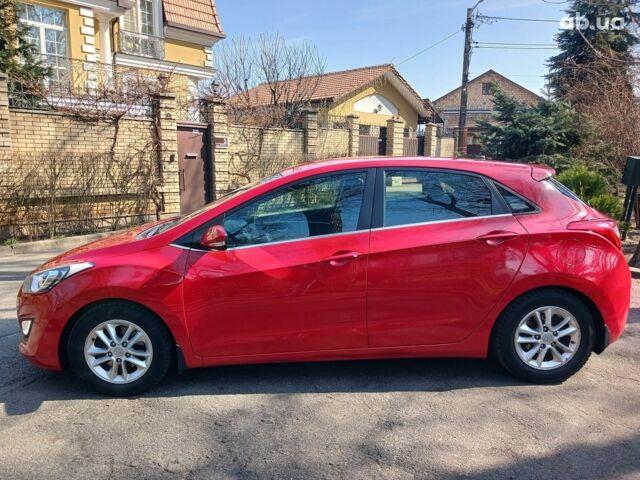 Червоний Хендай i30, об'ємом двигуна 1.6 л та пробігом 177 тис. км за 8990 $, фото 7 на Automoto.ua