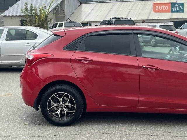 Хендай i30 2013 в Киеве на Automoto.ua Красный Хендай i30, объемом двигателя 1.4 л и пробегом 122 тыс. км за 9790 $, фото 3 на Automoto.ua