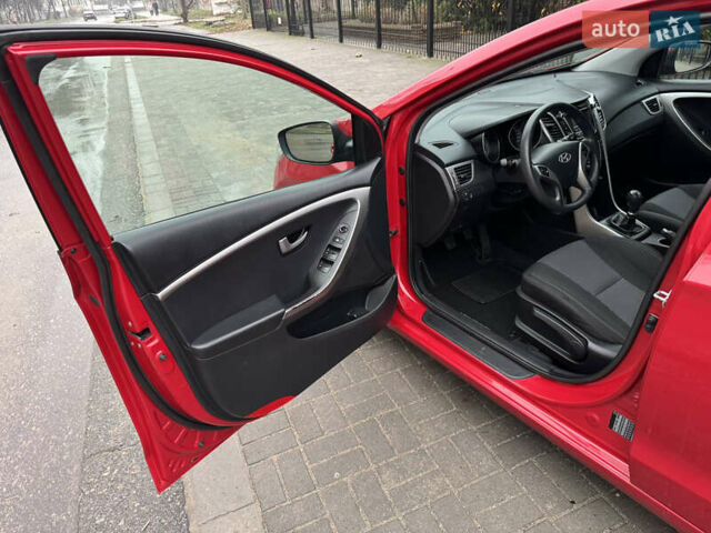 Червоний Хендай i30, об'ємом двигуна 1.4 л та пробігом 72 тис. км за 7800 $, фото 21 на Automoto.ua
