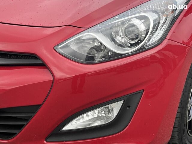 Хендай i30 2013 в Киеве на Automoto.ua Красный Хендай i30, объемом двигателя 1.4 л и пробегом 122 тыс. км за 9790 $, фото 26 на Automoto.ua