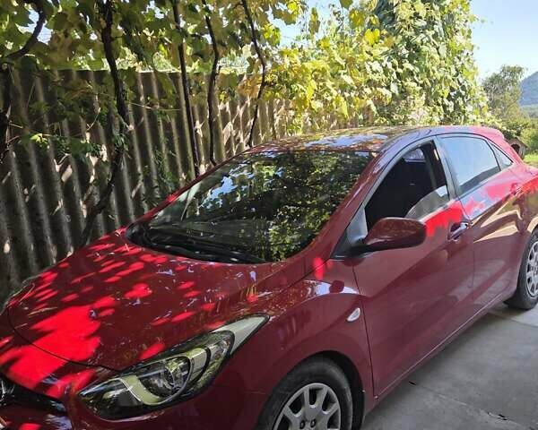 Красный Хендай i30, объемом двигателя 1.4 л и пробегом 33 тыс. км за 13000 $, фото 6 на Automoto.ua