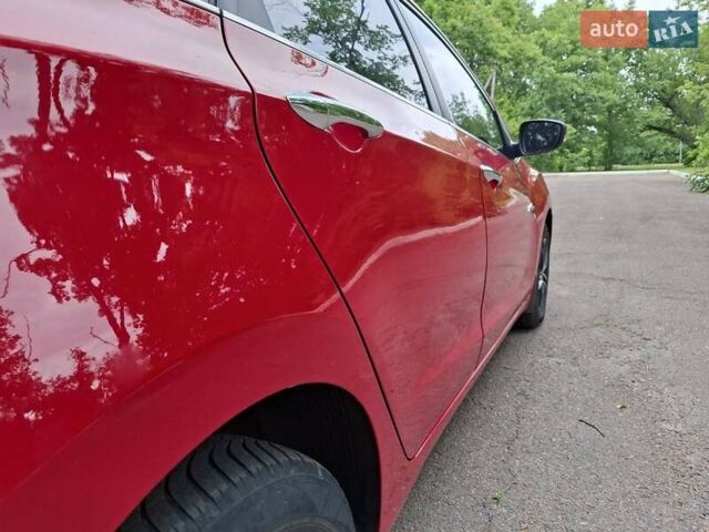 Красный Хендай i30, объемом двигателя 1.58 л и пробегом 208 тыс. км за 7700 $, фото 19 на Automoto.ua