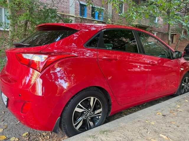 Красный Хендай i30, объемом двигателя 1.4 л и пробегом 80 тыс. км за 6300 $, фото 1 на Automoto.ua