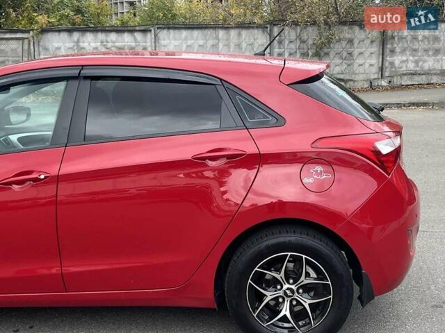 Хендай i30 2013 в Киеве на Automoto.ua Красный Хендай i30, объемом двигателя 1.4 л и пробегом 122 тыс. км за 9790 $, фото 8 на Automoto.ua