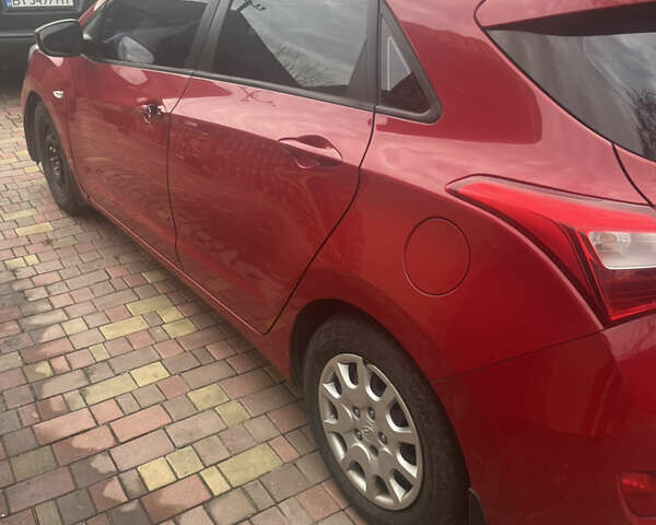 Червоний Хендай i30, об'ємом двигуна 1.6 л та пробігом 140 тис. км за 6500 $, фото 2 на Automoto.ua