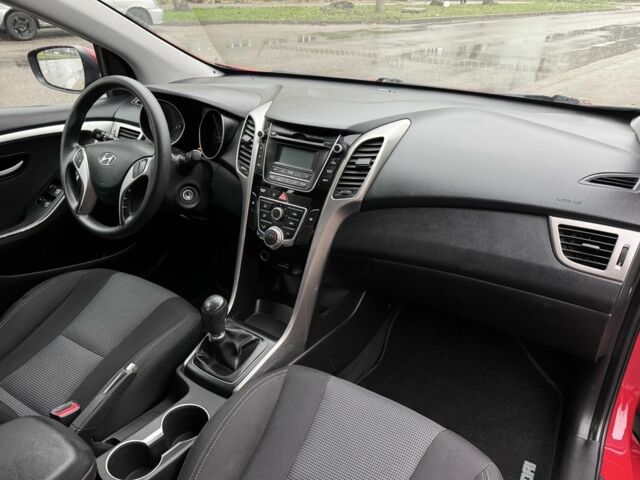 Червоний Хендай i30, об'ємом двигуна 1.4 л та пробігом 72 тис. км за 7800 $, фото 16 на Automoto.ua