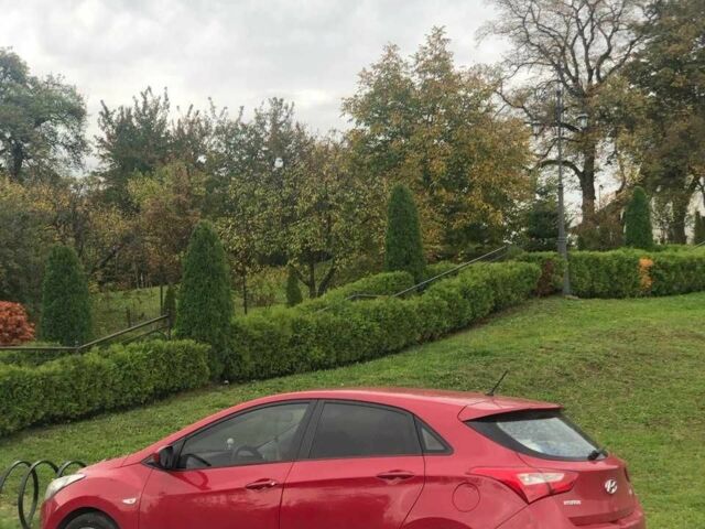 Красный Хендай i30, объемом двигателя 1.6 л и пробегом 233 тыс. км за 6500 $, фото 2 на Automoto.ua