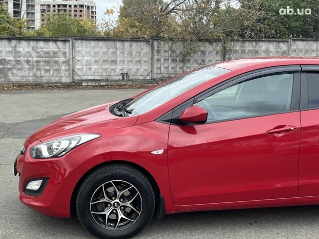 Хендай i30 2013 в Киеве на Automoto.ua Красный Хендай i30, объемом двигателя 1.4 л и пробегом 122 тыс. км за 9790 $, фото 8 на Automoto.ua