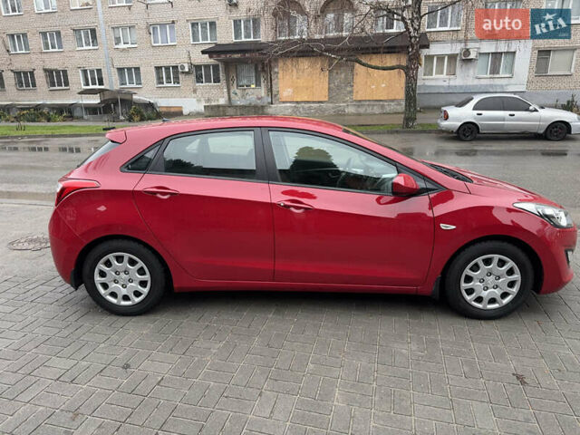 Червоний Хендай i30, об'ємом двигуна 1.4 л та пробігом 72 тис. км за 7800 $, фото 5 на Automoto.ua