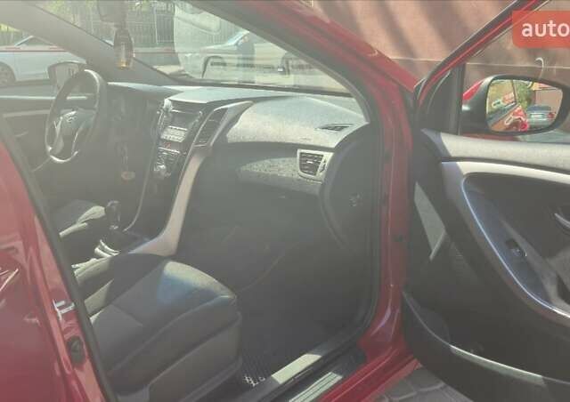 Красный Хендай i30, объемом двигателя 1.4 л и пробегом 155 тыс. км за 7600 $, фото 9 на Automoto.ua