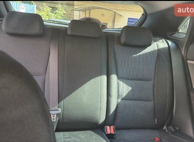 Красный Хендай i30, объемом двигателя 1.4 л и пробегом 155 тыс. км за 7600 $, фото 7 на Automoto.ua