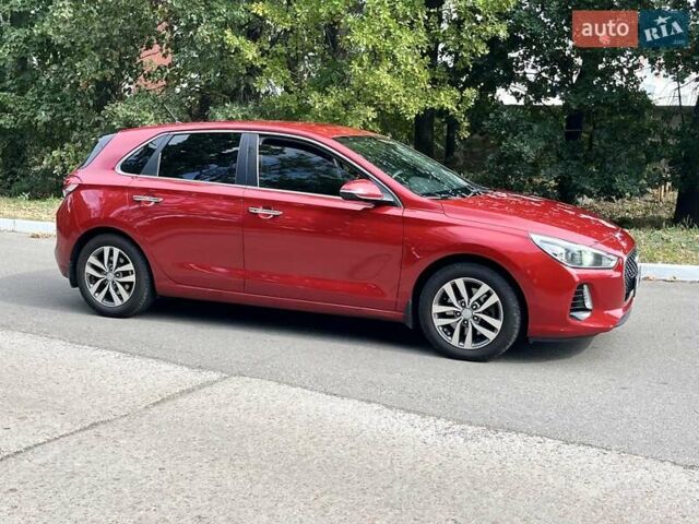 Красный Хендай i30, объемом двигателя 1.6 л и пробегом 111 тыс. км за 15200 $, фото 3 на Automoto.ua