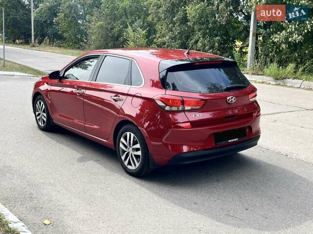 Красный Хендай i30, объемом двигателя 1.6 л и пробегом 111 тыс. км за 15200 $, фото 4 на Automoto.ua
