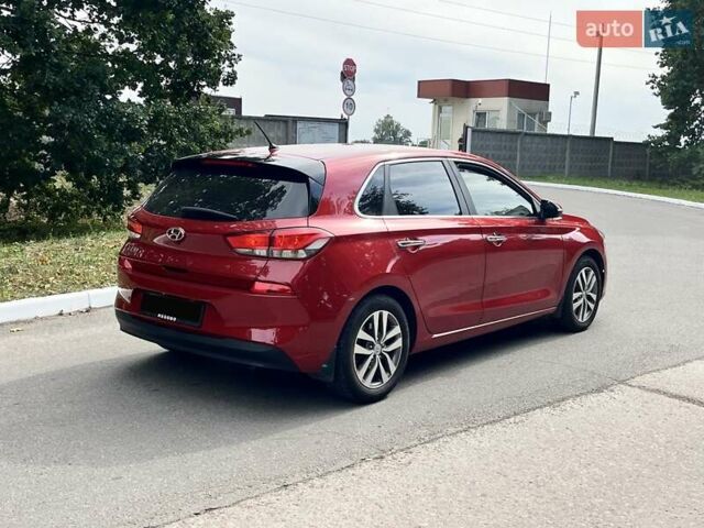 Красный Хендай i30, объемом двигателя 1.6 л и пробегом 111 тыс. км за 15200 $, фото 5 на Automoto.ua