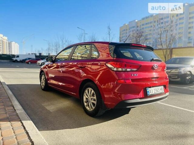 Красный Хендай i30, объемом двигателя 1.6 л и пробегом 21 тыс. км за 16499 $, фото 2 на Automoto.ua