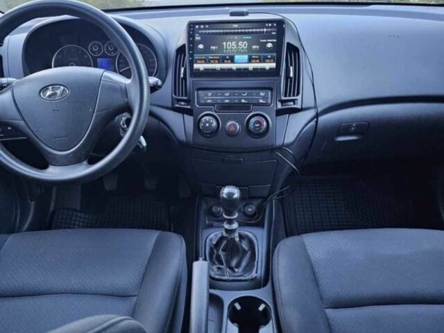 Красный Хендай i30, объемом двигателя 1.4 л и пробегом 197 тыс. км за 4041 $, фото 6 на Automoto.ua