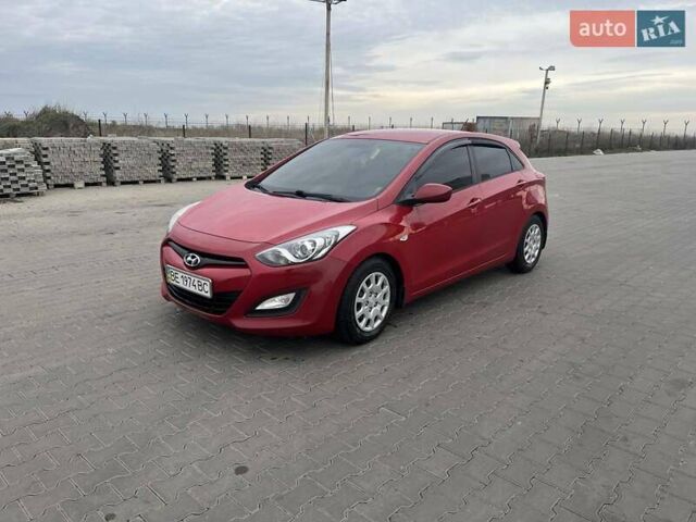 Червоний Хендай i30, об'ємом двигуна 1.4 л та пробігом 242 тис. км за 7300 $, фото 6 на Automoto.ua