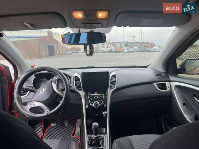Червоний Хендай i30, об'ємом двигуна 1.4 л та пробігом 242 тис. км за 7300 $, фото 2 на Automoto.ua