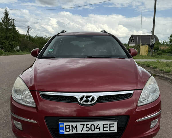 Красный Хендай i30, объемом двигателя 1.58 л и пробегом 200 тыс. км за 4100 $, фото 5 на Automoto.ua