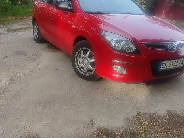 Червоний Хендай i30, об'ємом двигуна 1.6 л та пробігом 217 тис. км за 4950 $, фото 3 на Automoto.ua