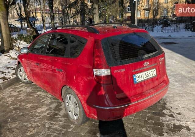 Красный Хендай i30, объемом двигателя 1.4 л и пробегом 199 тыс. км за 6000 $, фото 6 на Automoto.ua