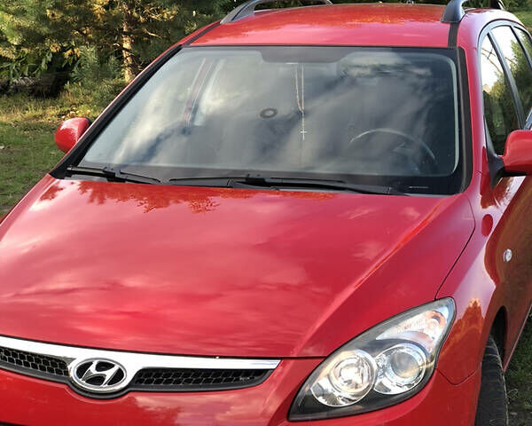 Красный Хендай i30, объемом двигателя 1.4 л и пробегом 222 тыс. км за 6200 $, фото 11 на Automoto.ua