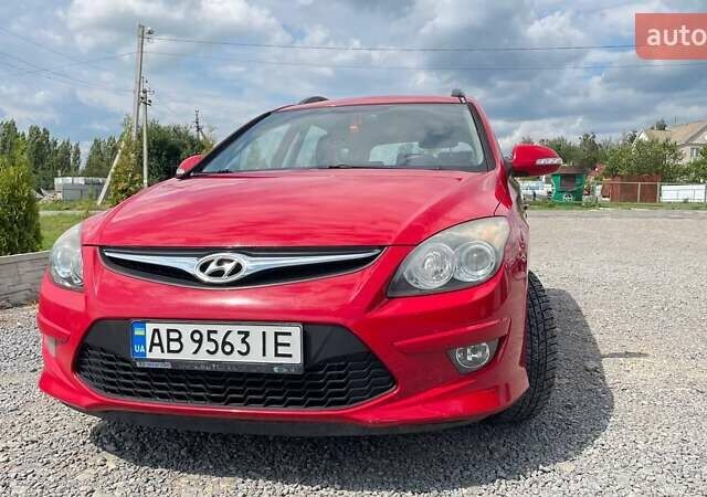 Красный Хендай i30, объемом двигателя 1.4 л и пробегом 230 тыс. км за 5999 $, фото 5 на Automoto.ua