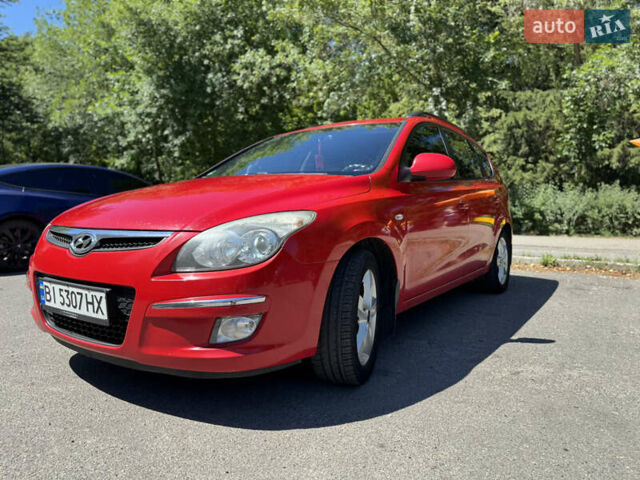 Красный Хендай i30, объемом двигателя 1.4 л и пробегом 302 тыс. км за 6000 $, фото 6 на Automoto.ua