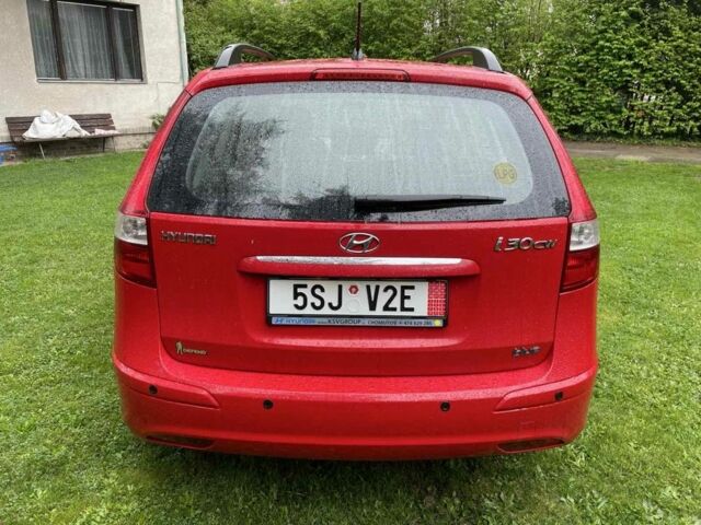 Красный Хендай i30, объемом двигателя 1.6 л и пробегом 237 тыс. км за 5799 $, фото 6 на Automoto.ua